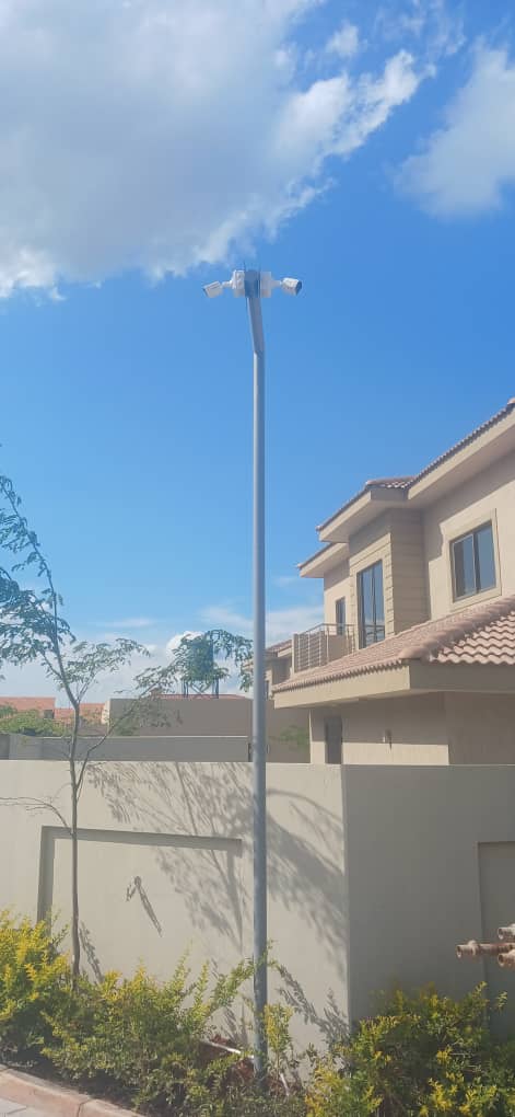 CCTV camera installation on a residential perimeter wall